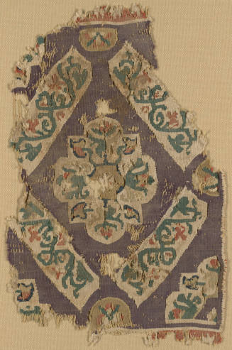 Fragment of a Decorative Band with Floral Medallion in Diamond Grid